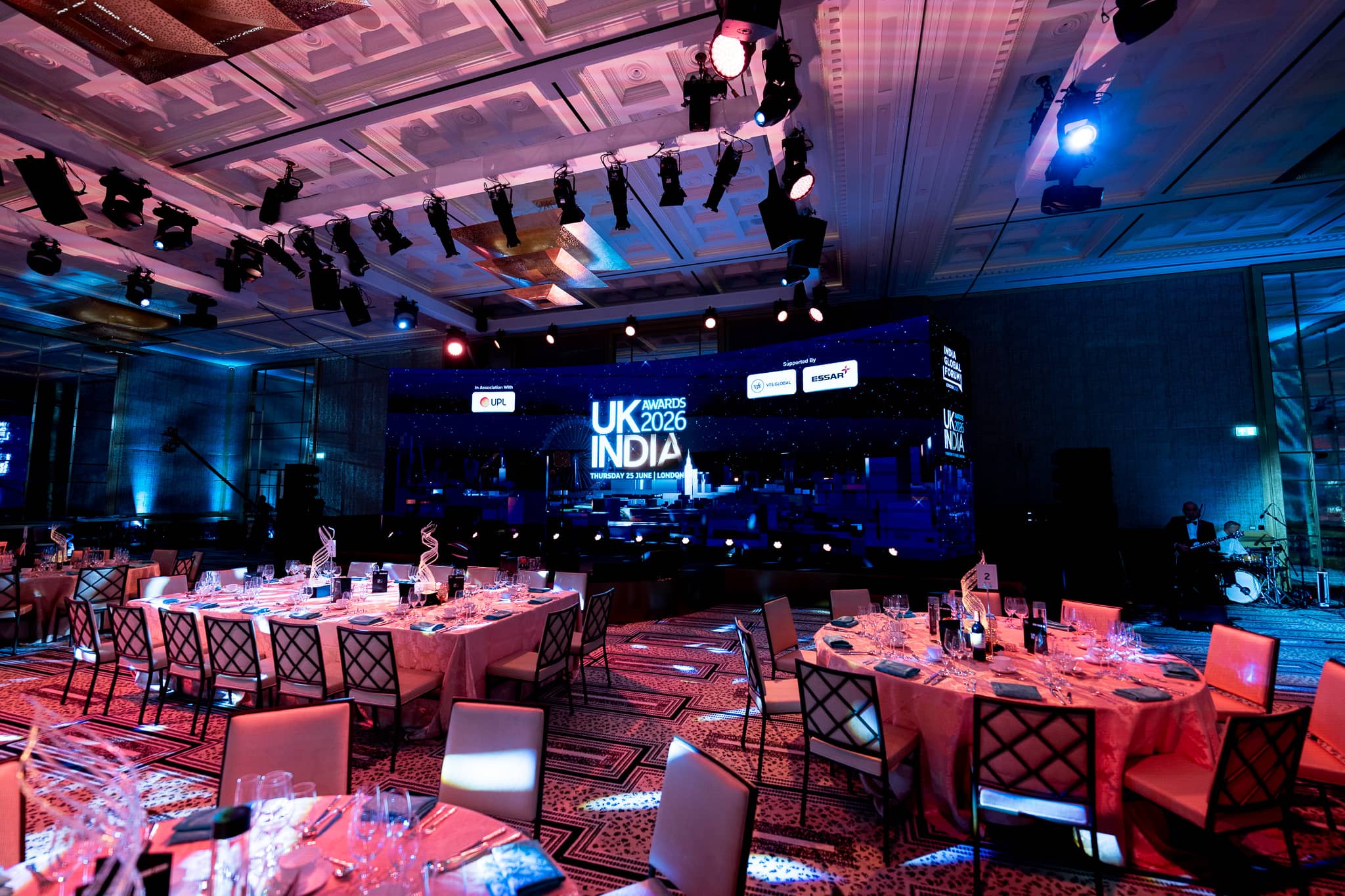 UK-India Awards 2026 at The Peninsula London, the ballroom set for the awards, tables and LED stage, by Kudos AV