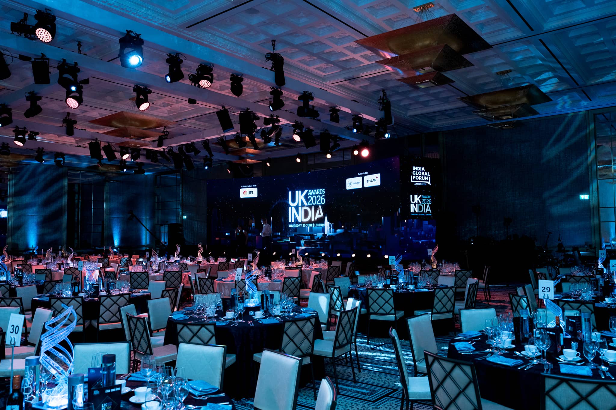 UK-India Awards 2026 at The Peninsula London, the ballroom under blue production lighting, by Kudos AV