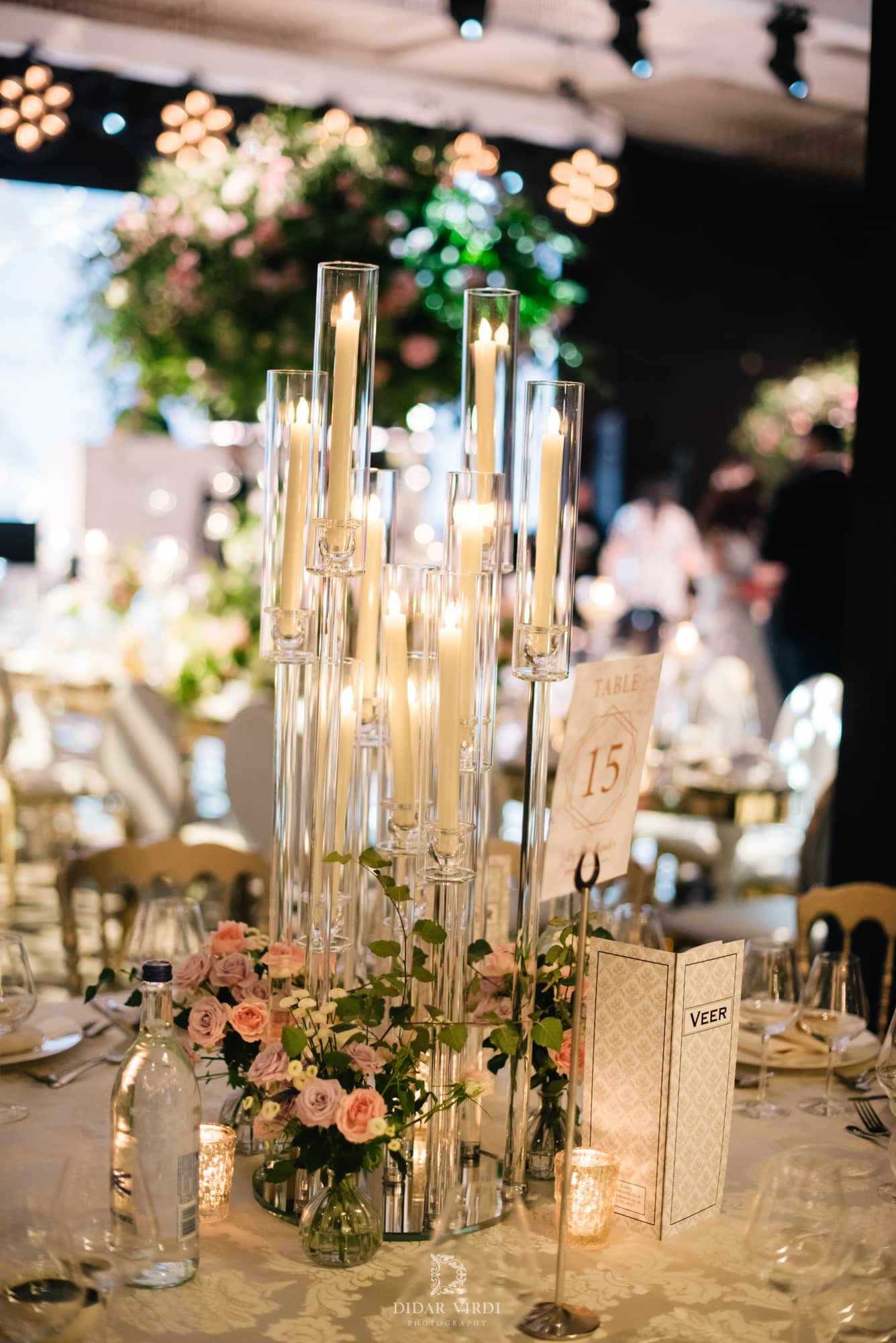 Luxury wedding at Hilton London Bankside, table styling with glassware and candles, by Kudos AV