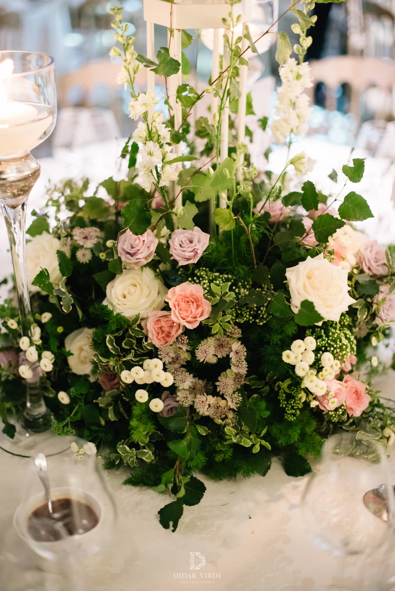 Luxury wedding at Hilton London Bankside, a floral centrepiece close up, by Kudos AV