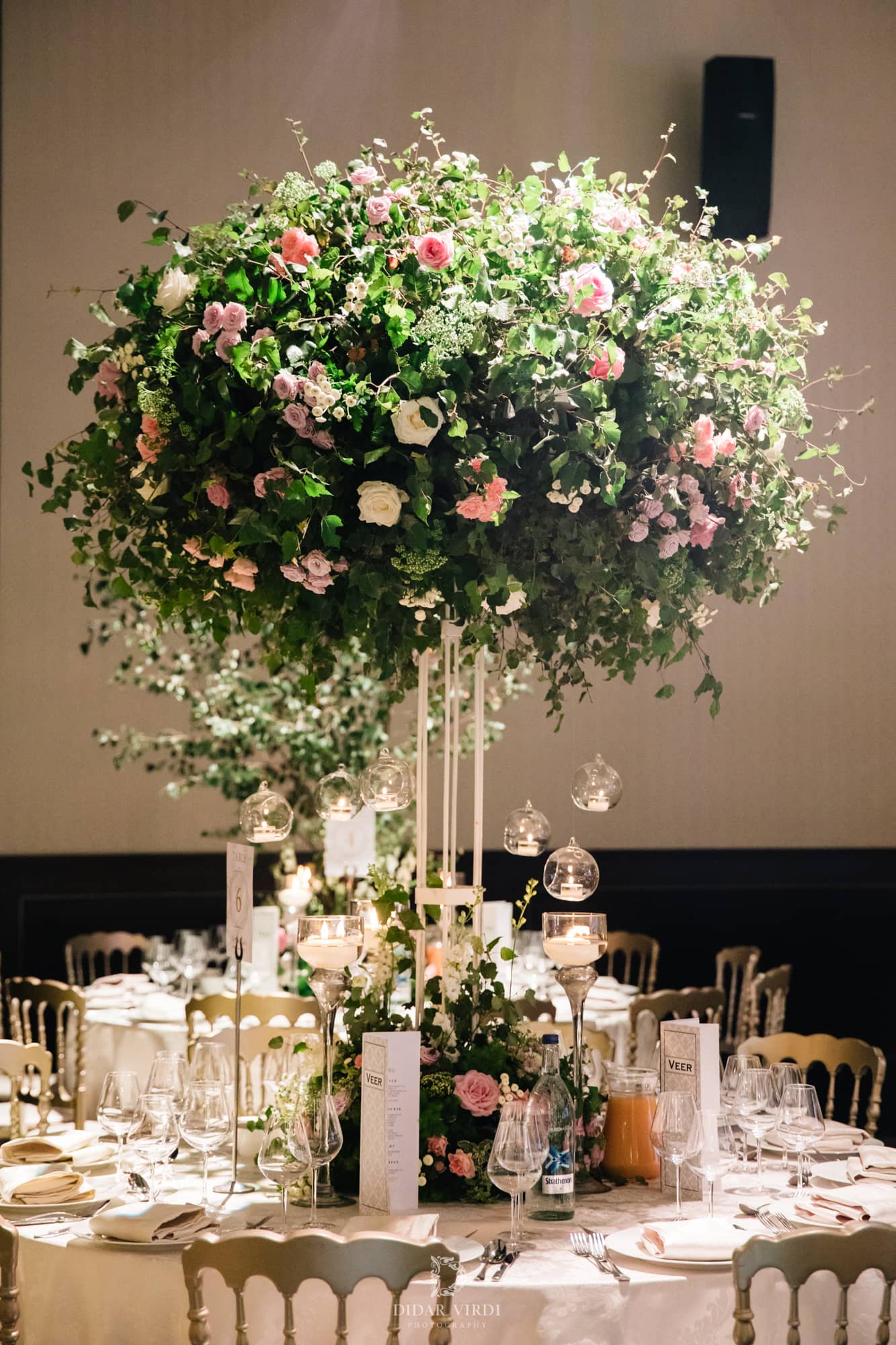 Luxury wedding at Hilton London Bankside, floral centrepieces and gold candelabra, by Kudos AV