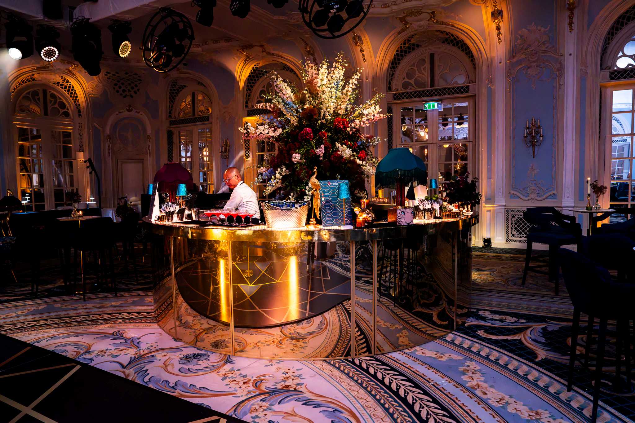 The bespoke gold bar in service under the gilded plasterwork at The Savoy, by Kudos AV