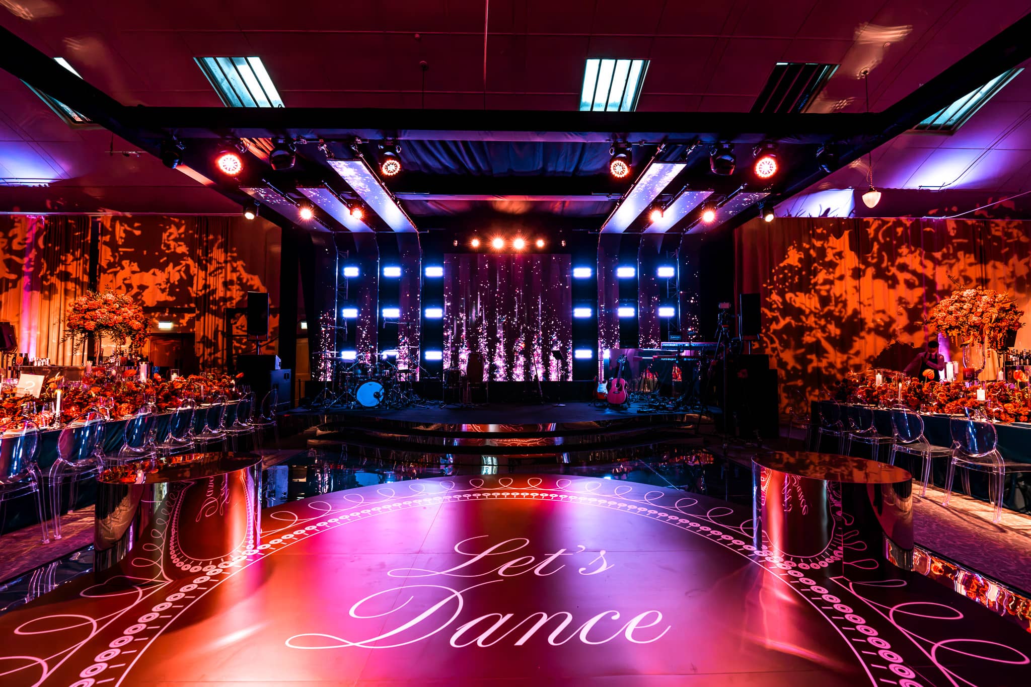 Tatton Park wedding in the Tenants' Hall, the dancefloor against the LED stage backdrop, produced by Kudos AV