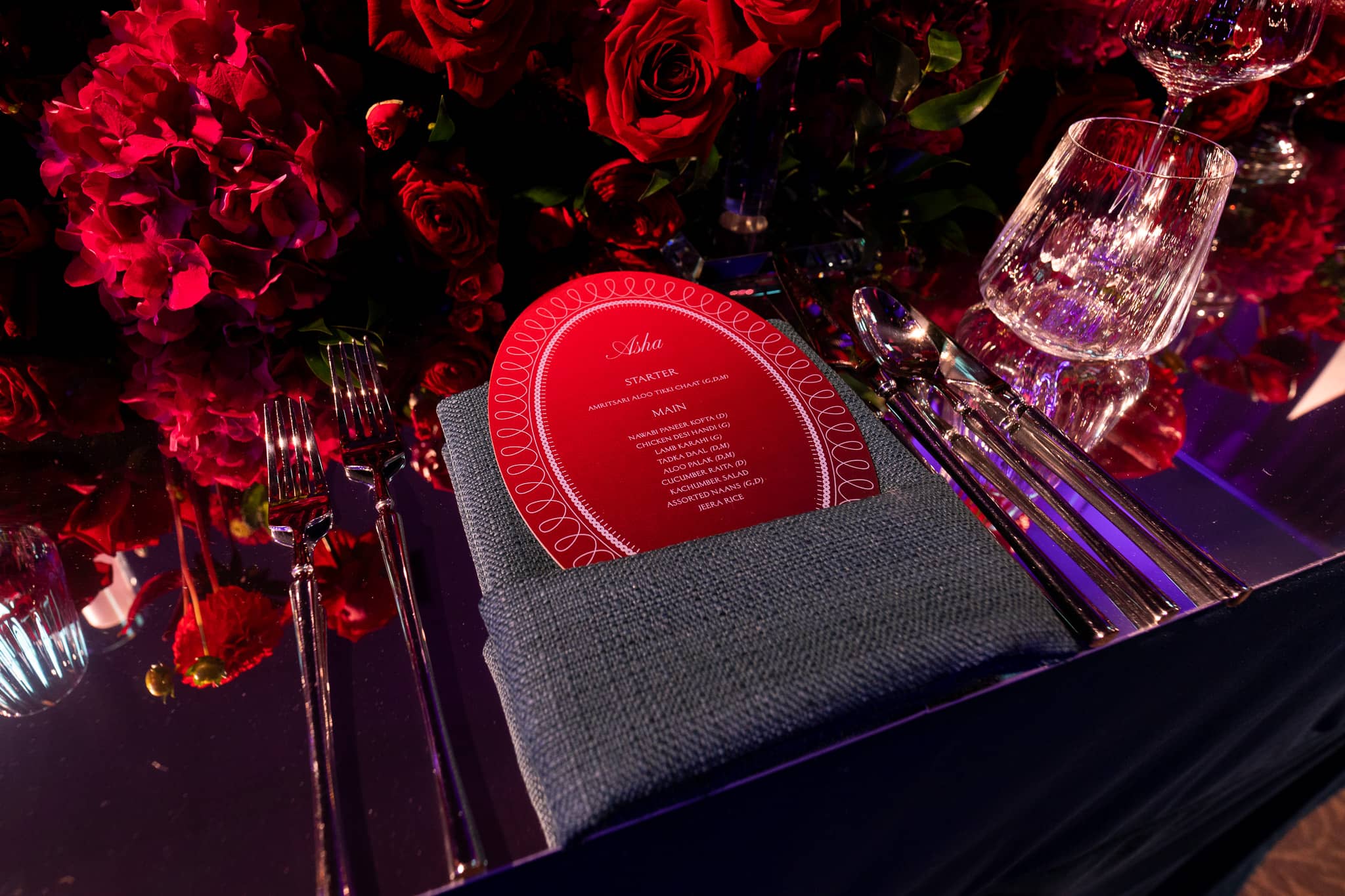 Place settings on the mirror-top family tables