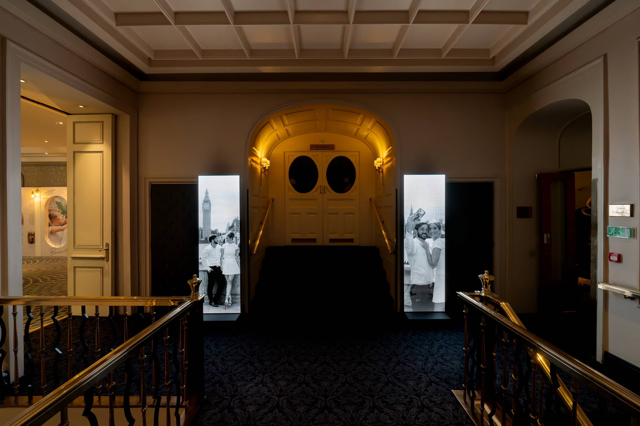Two LED totems flanking the gilded archway into the Lancaster Ballroom at The Savoy, motion content playing on both, by Kudos AV