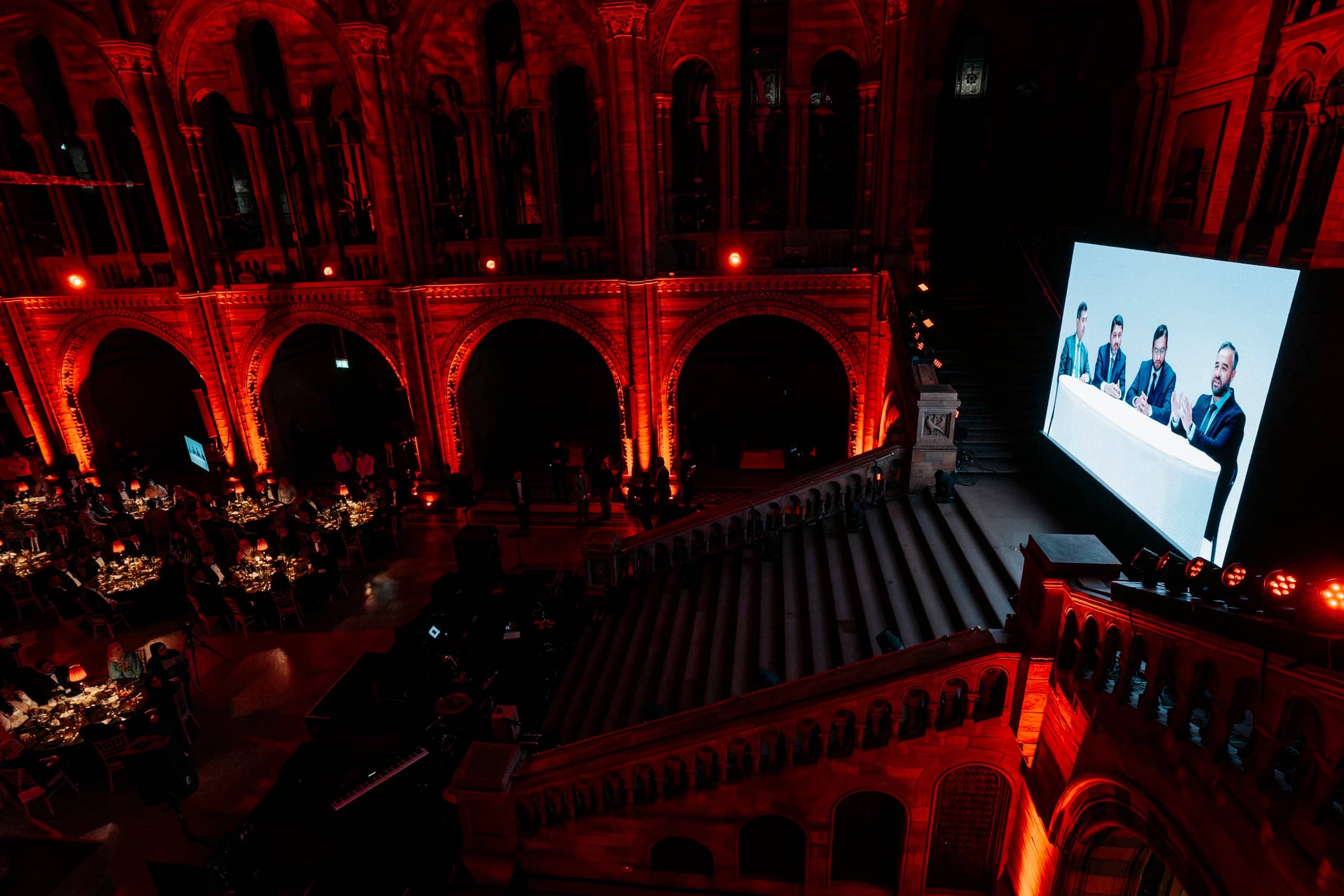 The stage and 6m x 4m LED screen at the end of Hintze Hall carrying the speakers during the Awakening Music 25th anniversary, by Kudos AV.