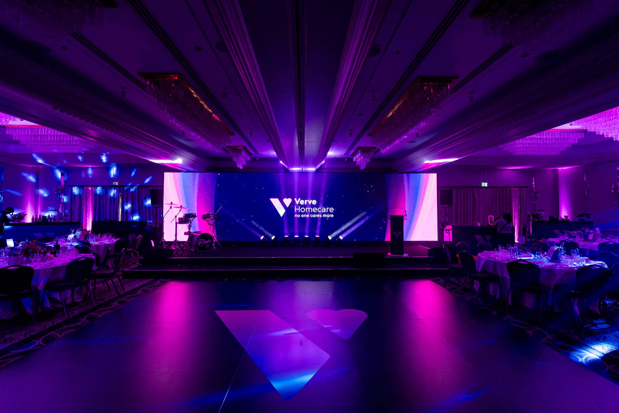 Wide view of the St Alban Suite before guests arrive, with the Verve Homecare LED wall, beam lighting and the dancefloor at the centre of the room.