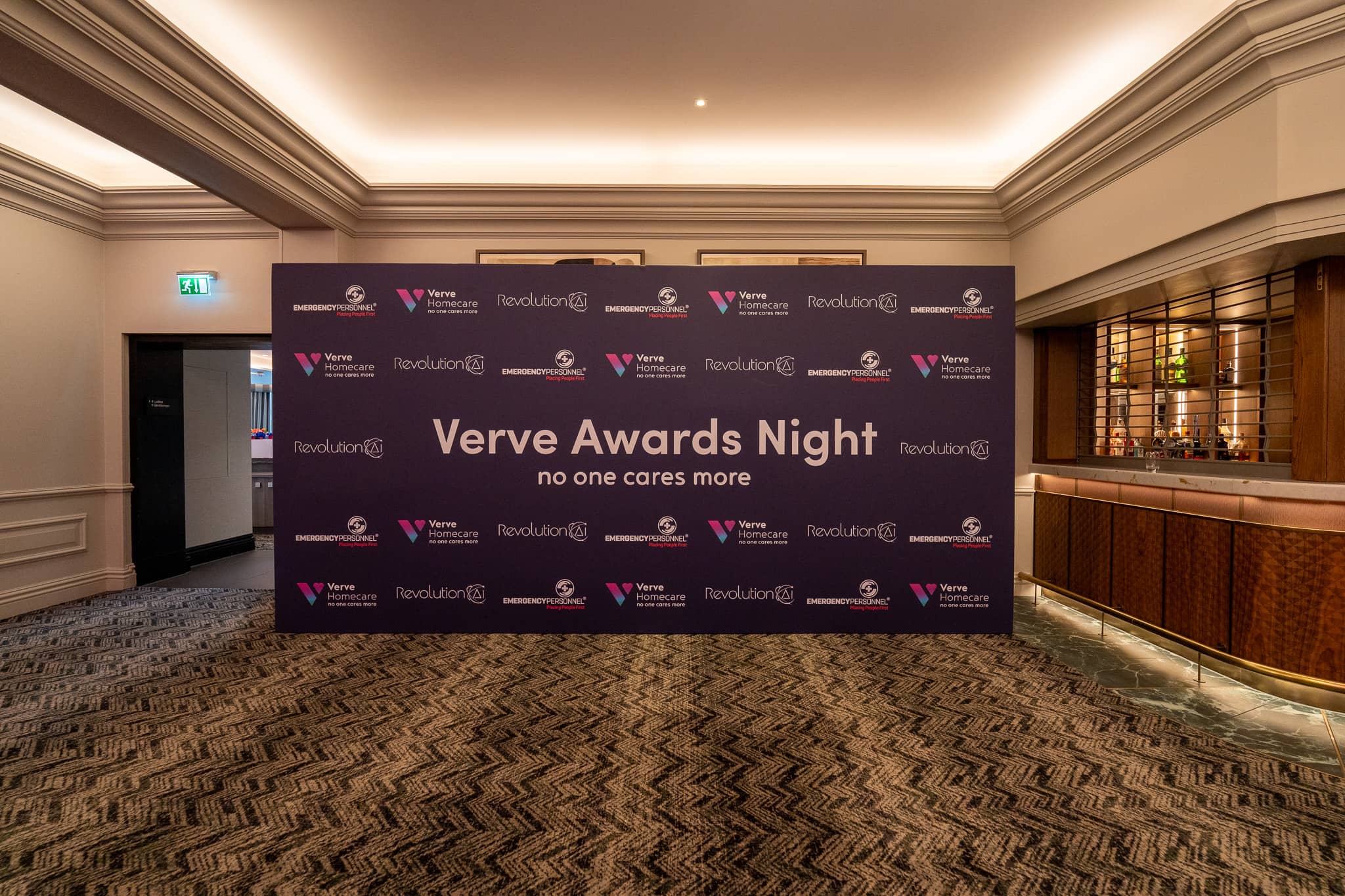 A printed Verve Awards Night step and repeat backdrop with Verve Homecare, Revolution AI and Emergency Personnel logos in the Sopwell House foyer.