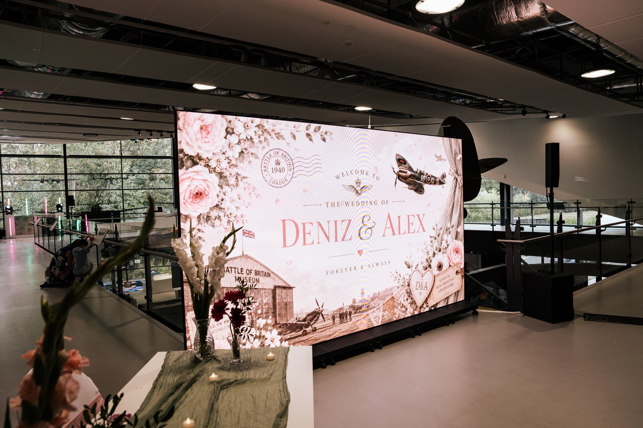 Six LED totem panels joined into a seamless Full HD wedding ceremony screen, hired from Kudos AV