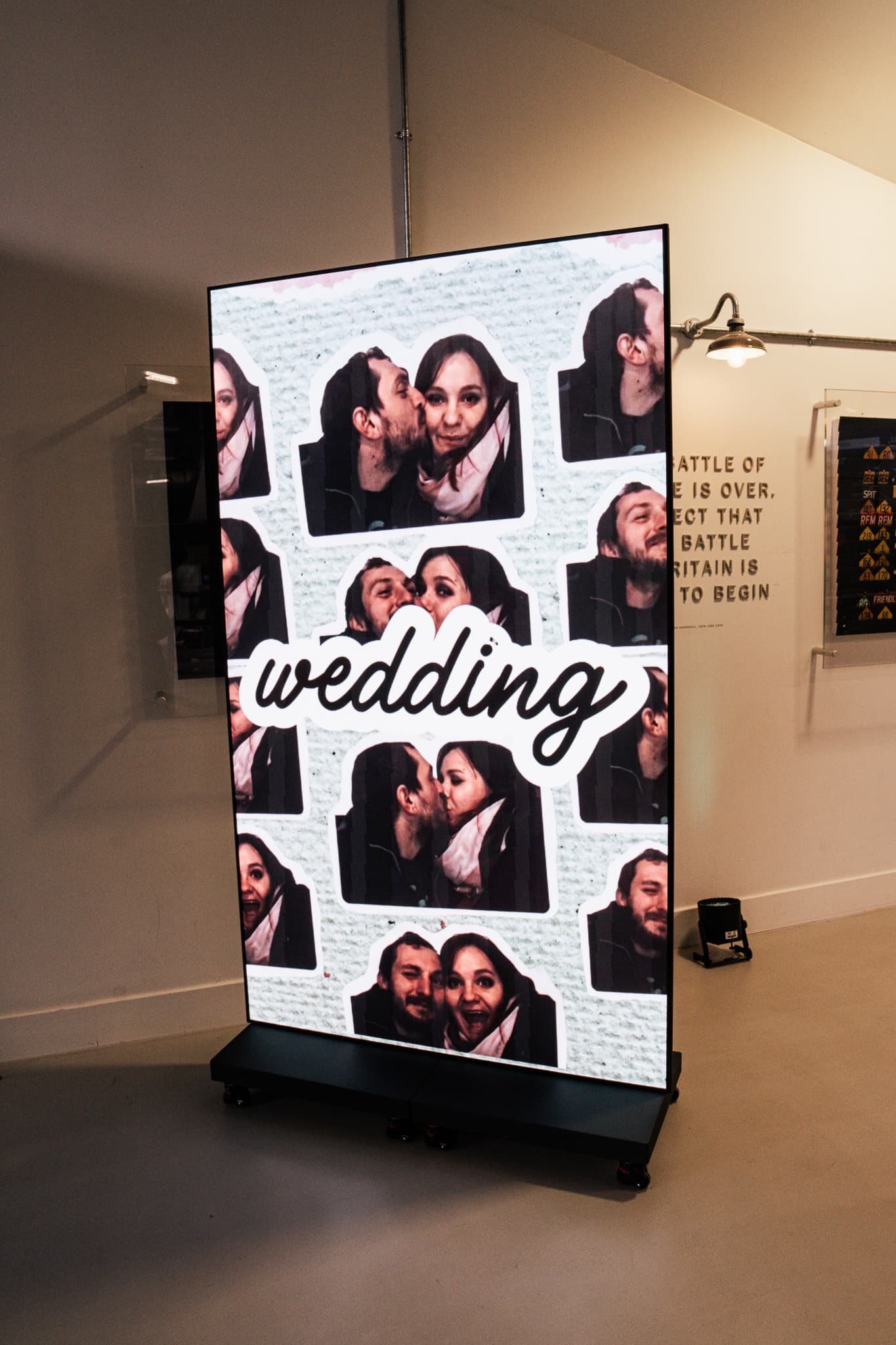 Two joined LED totem screens running a wedding photo collage, hired from Kudos AV