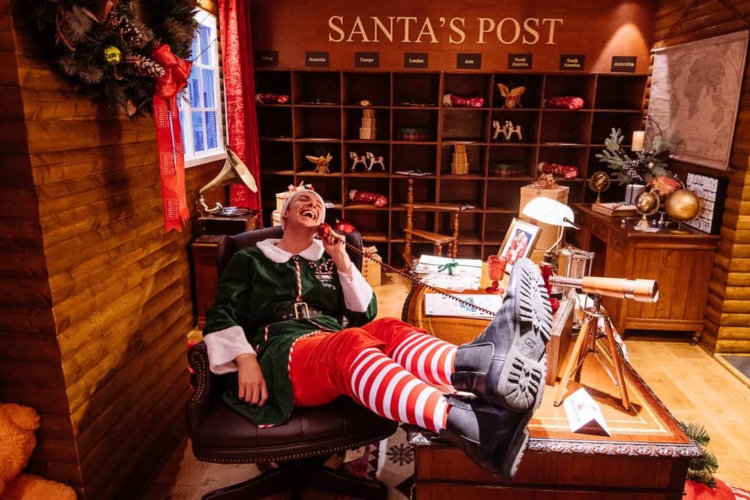 A colourful immersive festive activation produced by Kudos AV at the Hilton London Metropole