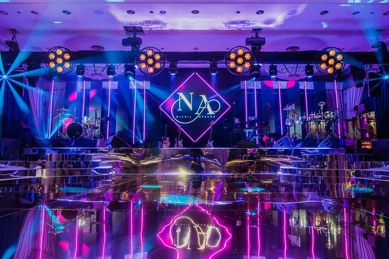 Wedding at Rosewood London, the room under pink and purple lighting, by Kudos AV